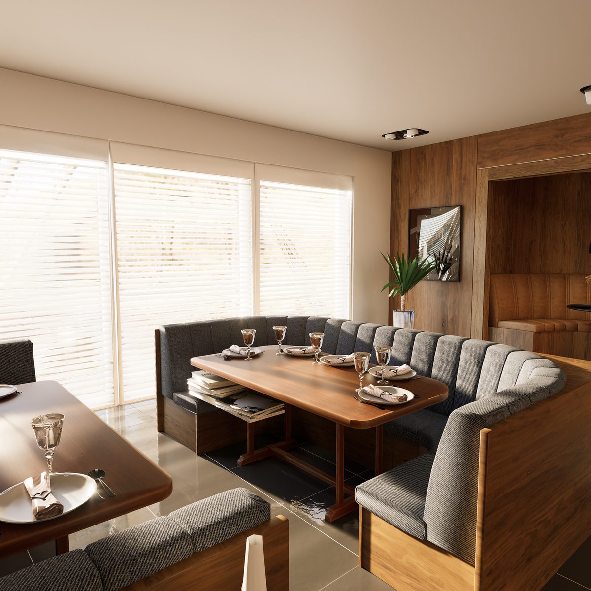 Comedor con mesas de madera y luz cálida